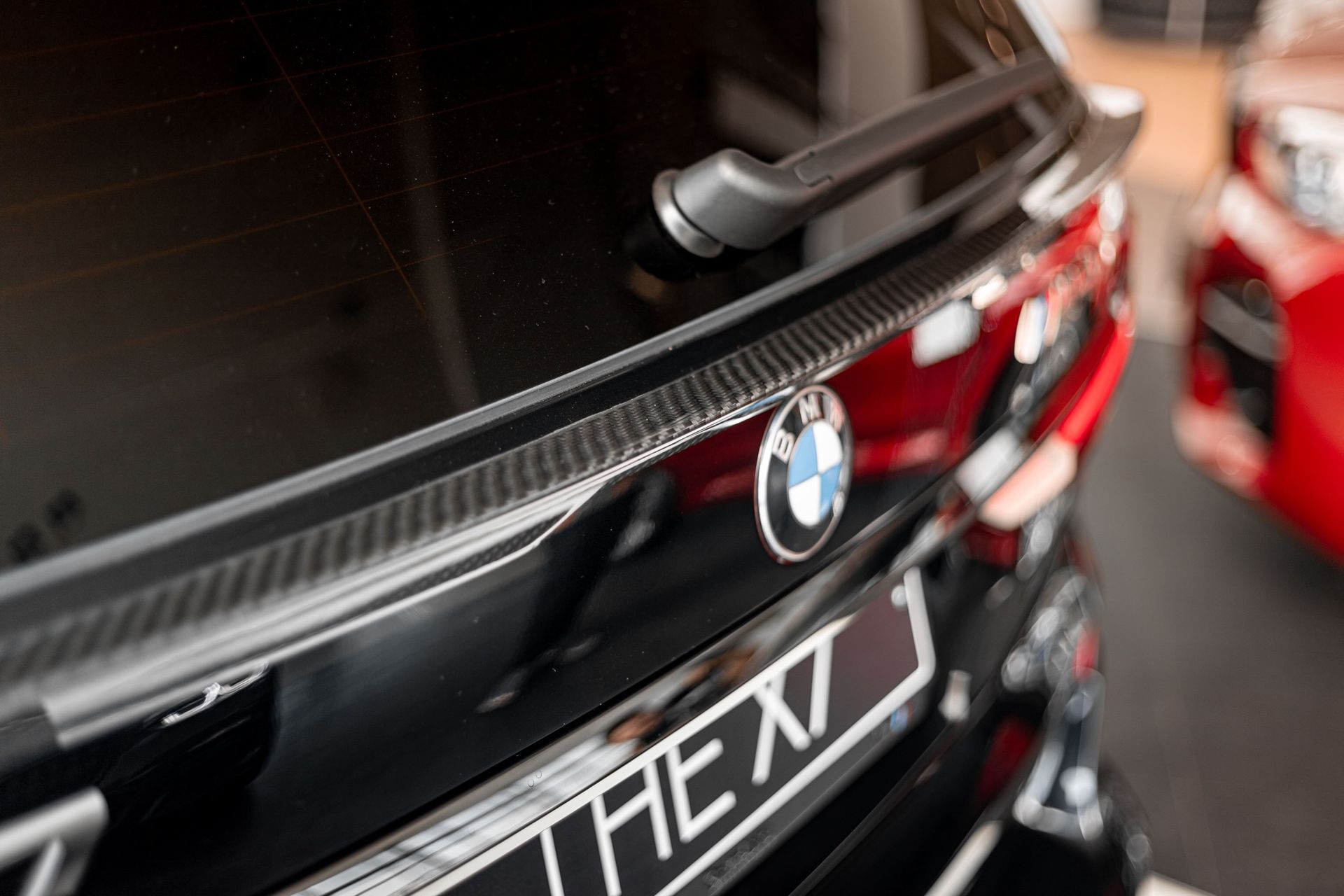Карбоновый спойлер для BMW X7 нижний