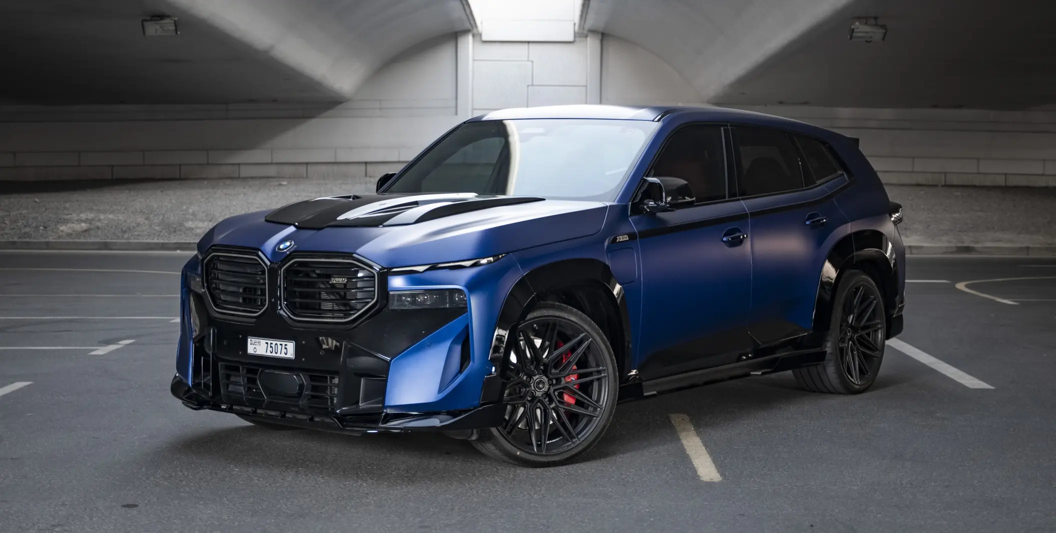 Matt blue BMW XM with gloss black kit from Dubai