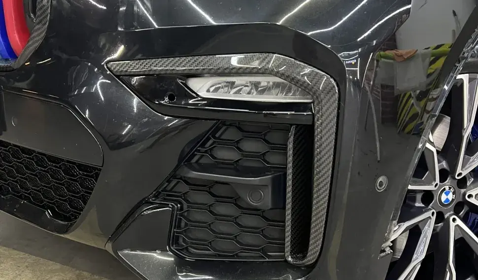 Carbon front bumper inserts for BMW X7