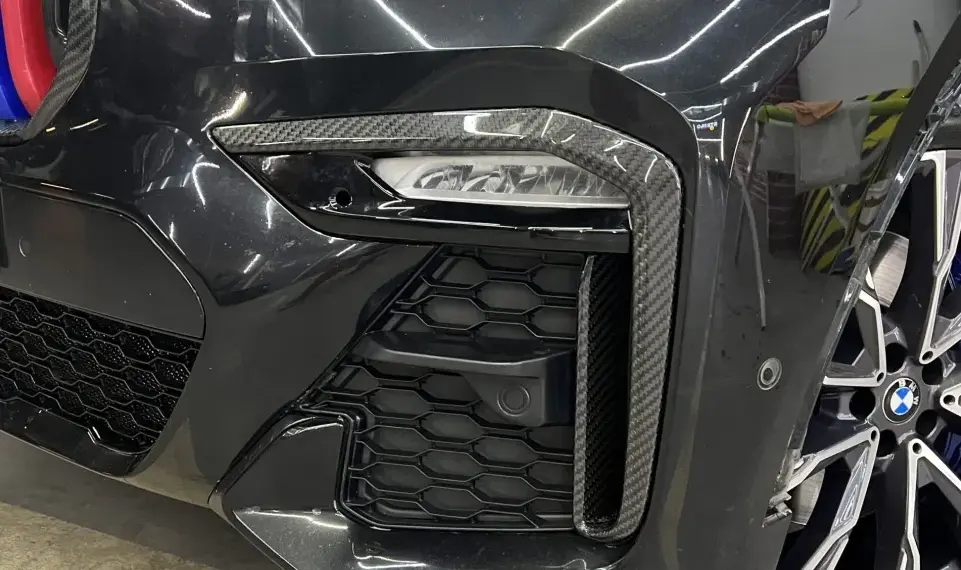 Carbon front bumper inserts for BMW X7